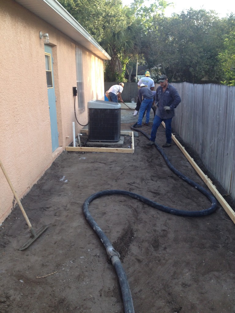 Starting to pour the concrete for the new slab.