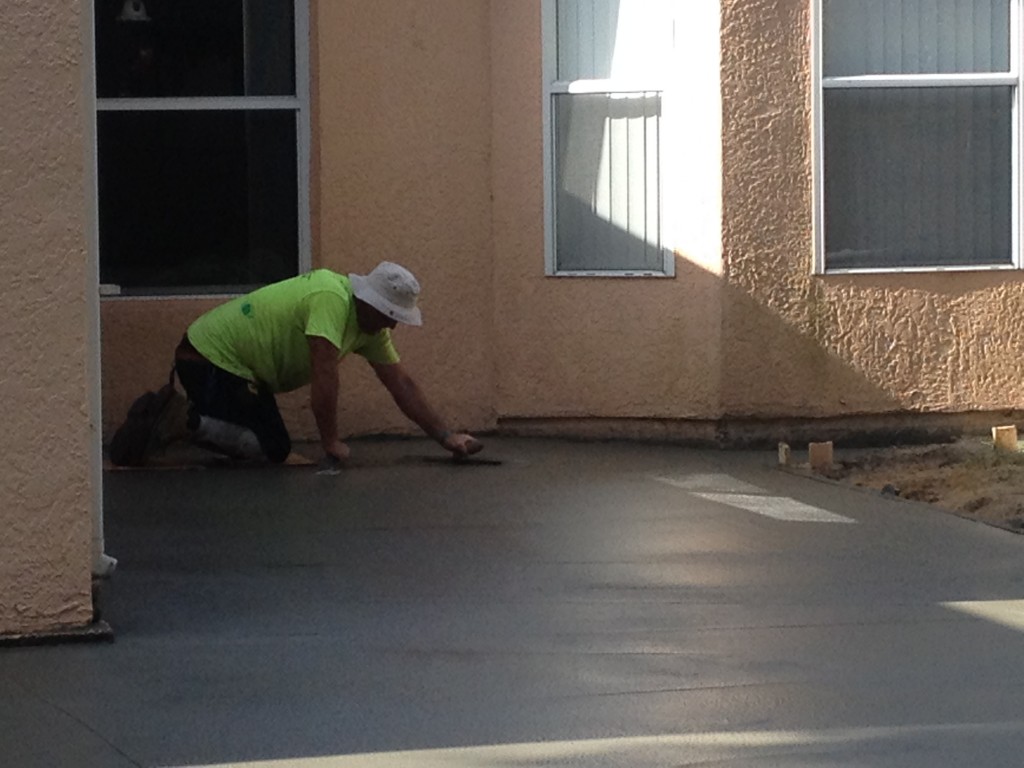 Smoothing out the concrete.